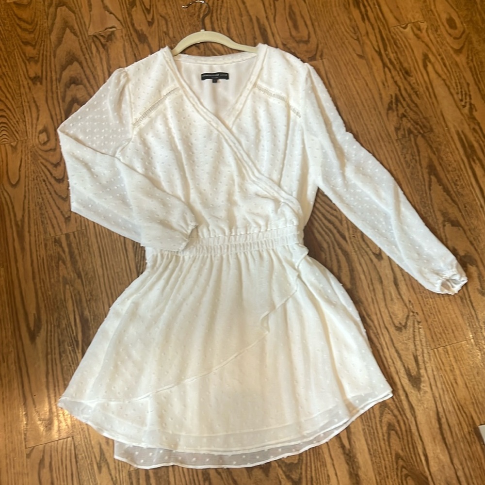 White, short in length, lined, long sleeve dress
